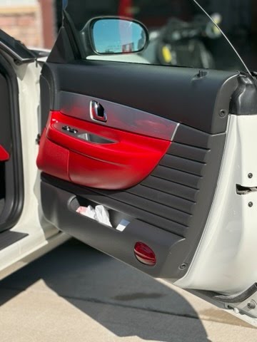 Clean red and black Thunderbird door panel
